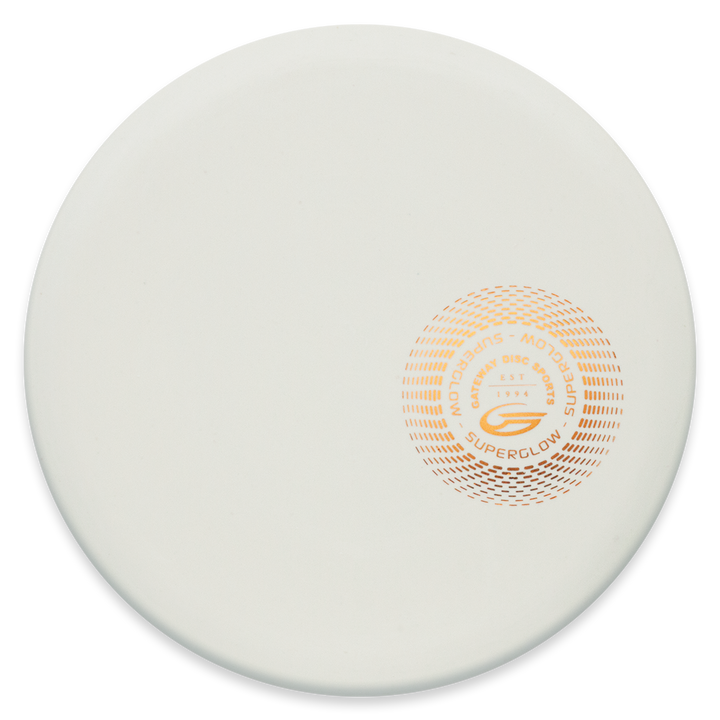 The Element - Suregrip Superglow is a white, round disc featuring an orange circular logo and "Superglow" text, crafted for reliable mid-range throws with straight flight and impressive glide.