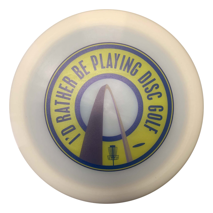 The St. Louis Hockey Full Color Drivers is a white disc golf disc featuring a yellow and blue "I'D RATHER BE PLAYING DISC GOLF" graphic with a disc golf basket and arch inspired by St. Louis hockey—ideal for fans of fairway drivers.