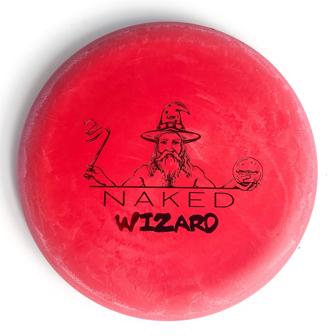 A red SSS Wizard - NAKED putt disc featuring an illustration of a wizard with a staff and crystal ball.