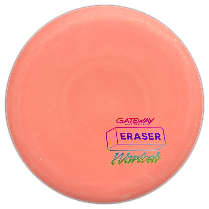 The Warlock - Eraser is a pink disc golf putter with a rectangular eraser graphic and brand logo, recognized for its stable flight.