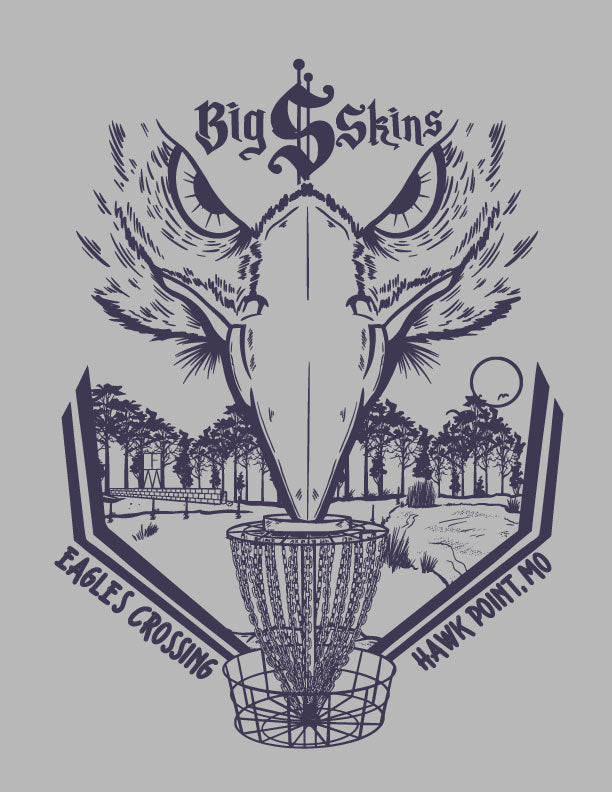 The Big $ T-Shirt features Ivan Marston's graphic: an eagle skull above a disc golf basket, trees in the background, and "Big Skins," "Eagles Crossing," and "Hawk Point, MO." Designed for the Big $ Championship on soft cotton.