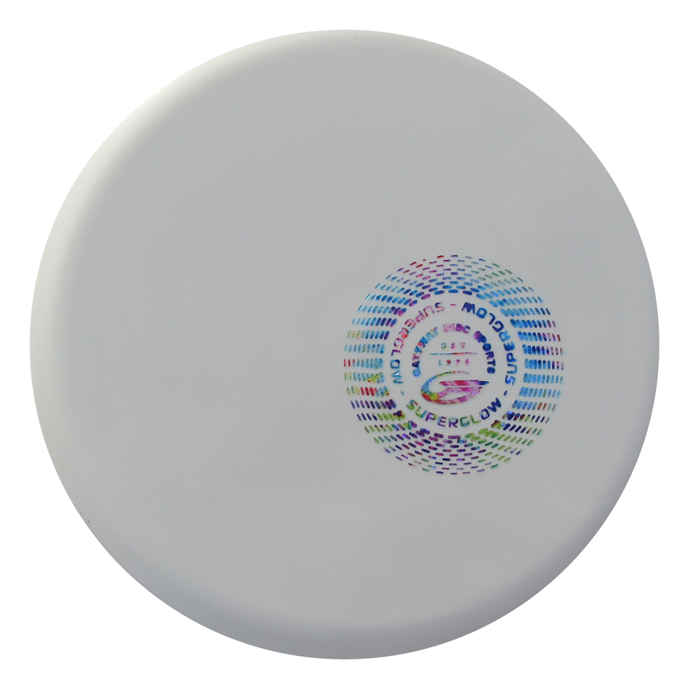 The Mystic - SureGrip™ Superglow is a white disc golf disc featuring a colorful circular pattern and “Superglow” text, designed for effortless straight flights and dependable glide.